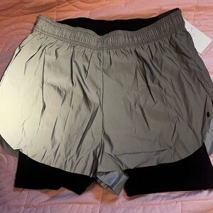 Calia NWT reflective, high-rise 5 inch run shorts